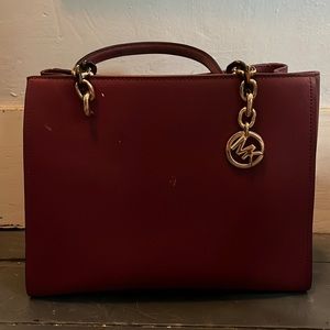 Small burgundy Michael Kors bag